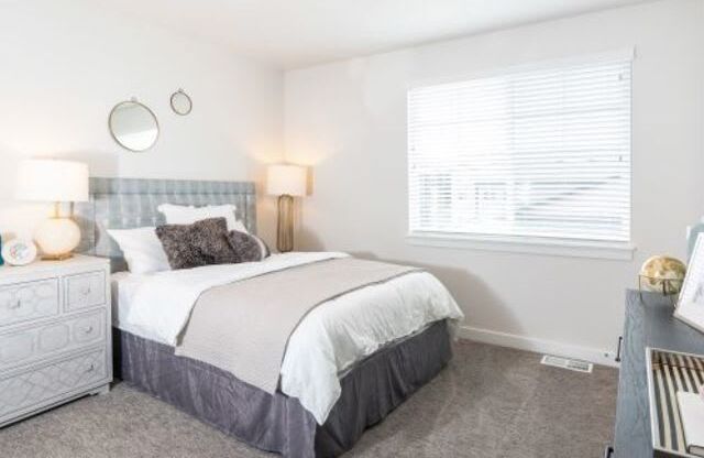 Full-size Guest Bedroom at Parc on 5th Apartments