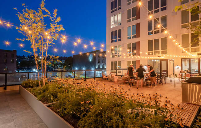 The Warren Apartments patio dining at night