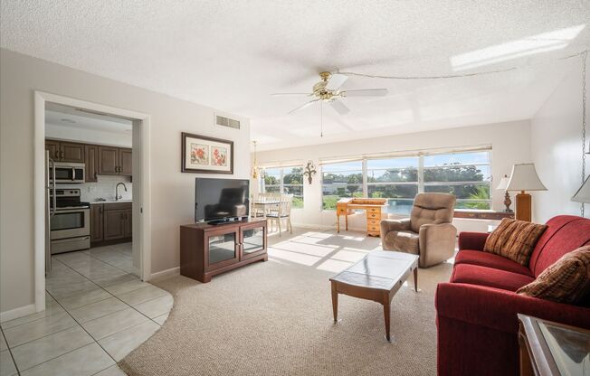 Octover Move-In Special! Furnished or Unfurnished 2BR/2BA Condo in Premier 55+ Penthouse Groves Community!