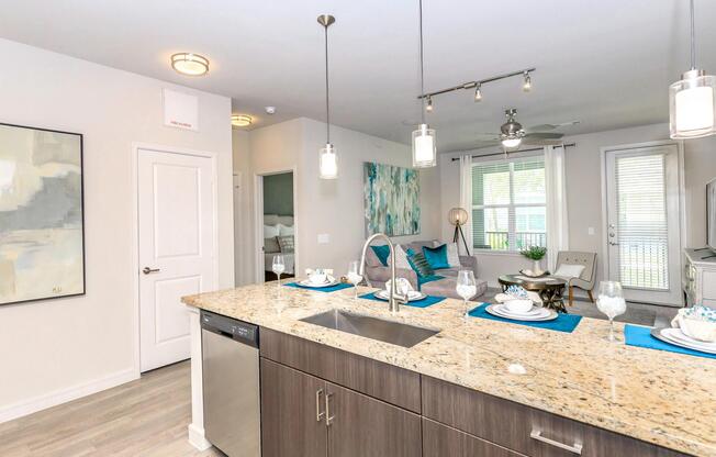 a kitchen with a sink and a window