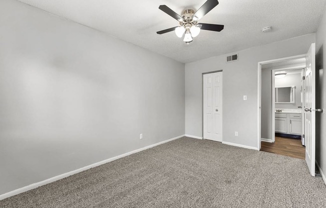 Pet-Friendly Apartments in Overland Park, KS - Treetop Lodge - Photo of Bedroom with Ceiling Fan