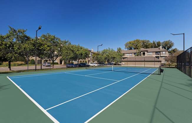 The Estates at River Pointe outdoor lighted tennis court
