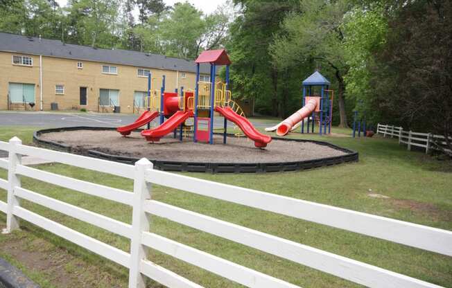 a playground with slides in a park