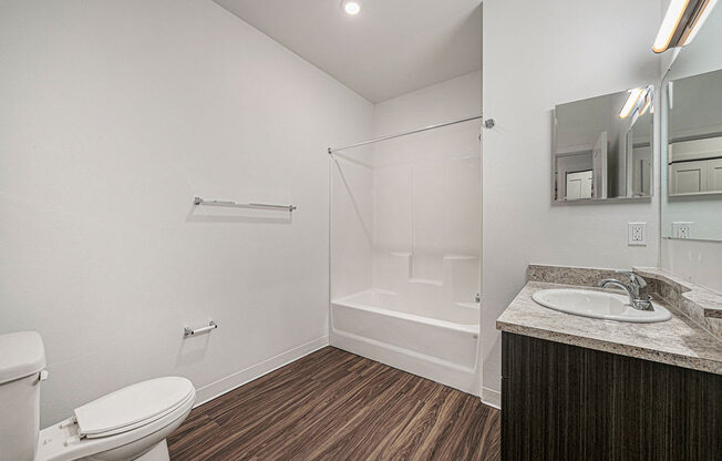 main bathroom with hard surface flooring at Trade Winds Apartment Homes, Elkhorn, NE