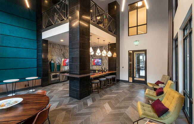 A modern living room with a wooden table and yellow chairs.