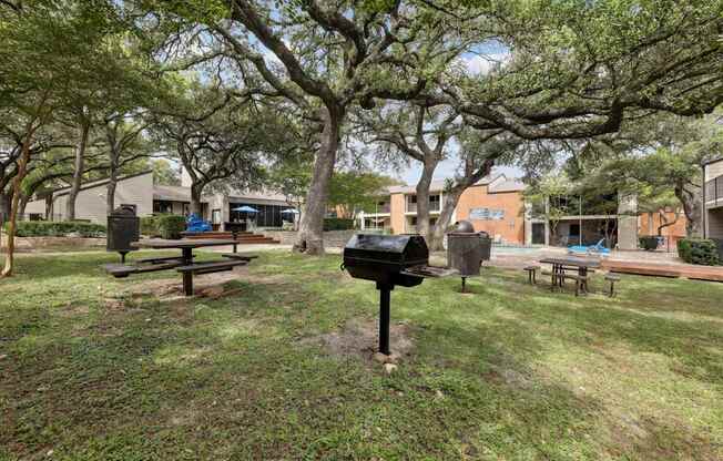 BBQ grill surrounded by lush landscaping at Westdale Pointe in Austin, TX