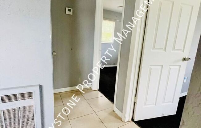 1409 E 108 AVE