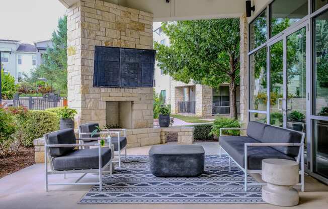 outdoor fireside lounging area at The Allure apartments