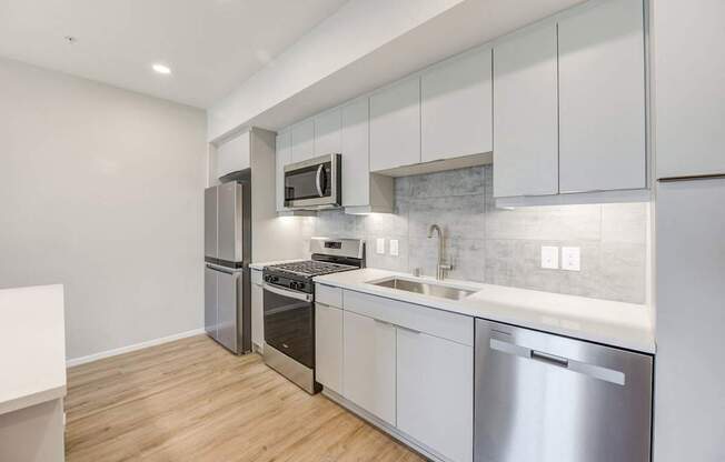 Kitchen with stainless steel appliances at The Overlook Santa Clarita, CA 91350