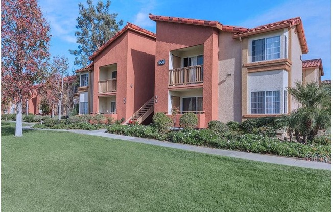 our apartments are located in a quiet neighborhood with a green lawn at Riverview Springs, California