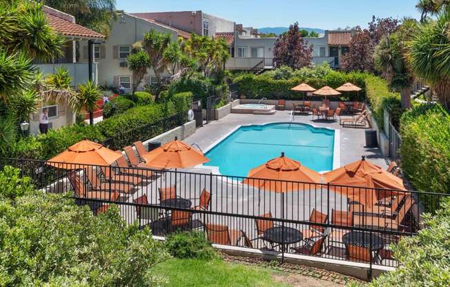 San Jose CA Apartments-Village Of Taxco Apartments Gated Pool With Lounge Chairs And Shaded Seating And Jacuzzi