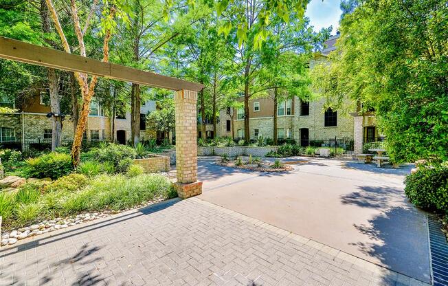 Lush grounds at Bentley Place at Willow Bend Apartments in West Plano, TX, For Rent. Now leasing 1, 2, and 3 bedroom apartments.