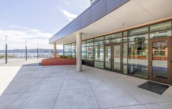 a view of a building with glass windows and doors at Marina Square, Bremerton, 98337
