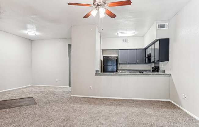 Spacious living room area at Laurels of Sendera apartments in Arlington, TX