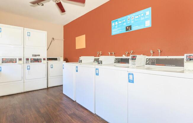 a large white refrigerator in a kitchen