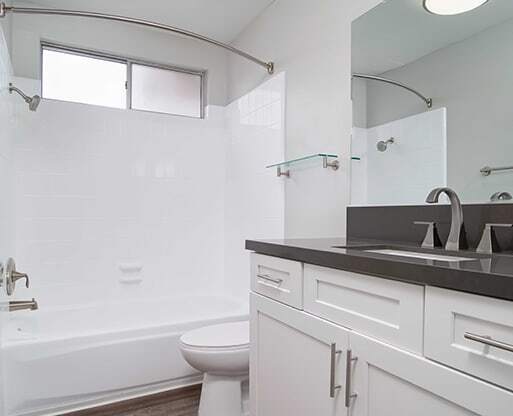 Tub, Toilet In Bathroom at Los Robles Apartments, Pasadena, California