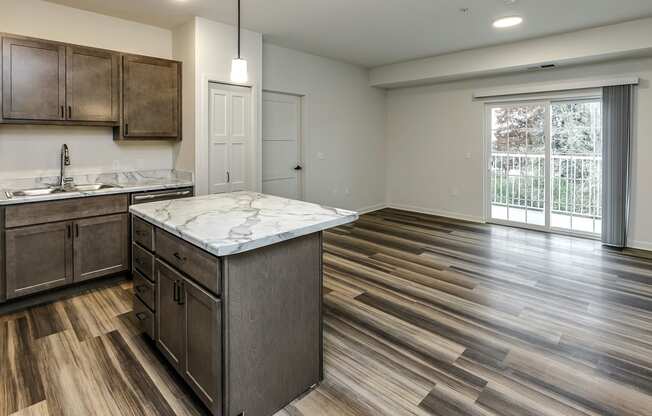 New building with white and dark color schemes with one, two and three bedroom apartment homes at CopperCreek Apartments in Council Bluffs, IA