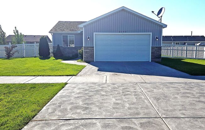 Beautiful & Bright 3 bed, 2 bath Home for Rent in Idaho Falls!  2 Car Garage & Fenced Yard by Real Property Management