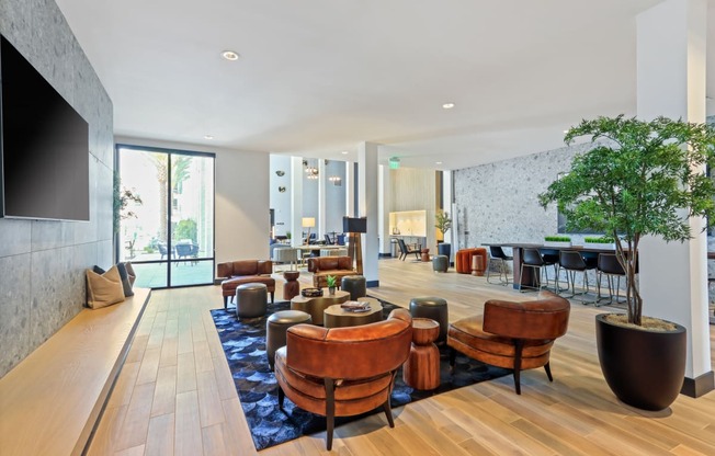 Living room filled with furniture and a large window at Array La Mesa, La Mesa