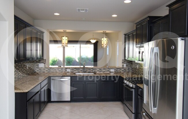 4414 E ANGELA DR