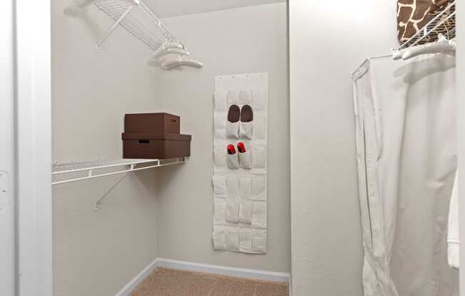 a walk in closet in a 555 waverly unit