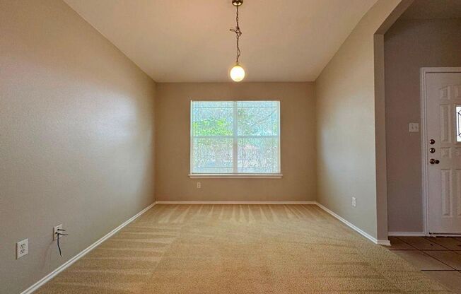 126 Salado Dr in Kyle is a charming single-story brick home nestled in the Silverado at Plum Creek community!