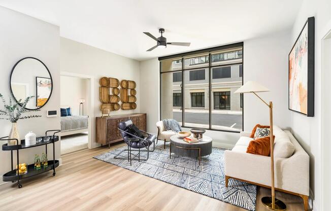 Bright and stylish, the living spaces at Modera Liberty Row feature expansive windows and refined finishes, creating a welcoming home in Charlotte.