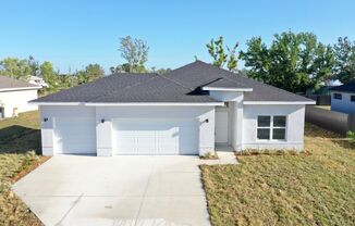 Be the first to rent this one year old new construction 4 bed 2 baths fenced backyard  3-CAR GARAGE home