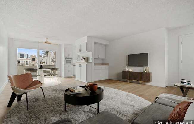 A modern living room with a brown chair and a grey rug.