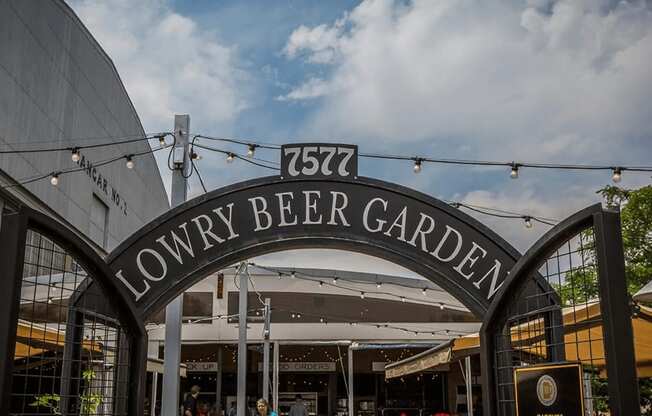 a sign that reads beer garden in front of a building