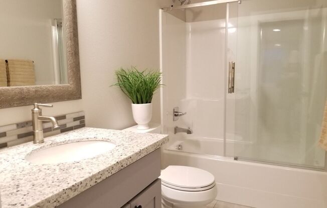 Fantastic Updated Corner Two-Level Unit in a Convenient Location!