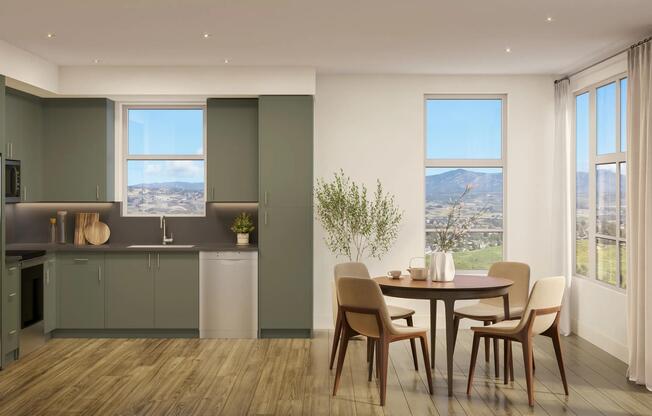 Open kitchen with painted cabinetry, sleek surfaces, and expansive corner windows bringing in daylight and framing rolling hillside scenery.