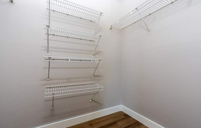 our spacious closets are equipped with shelves and hooks for hanging clothes