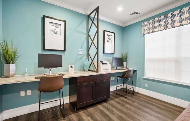 counter with computers and stools