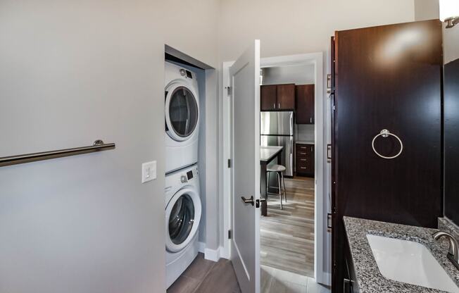 a bathroom with a washer and dryer
