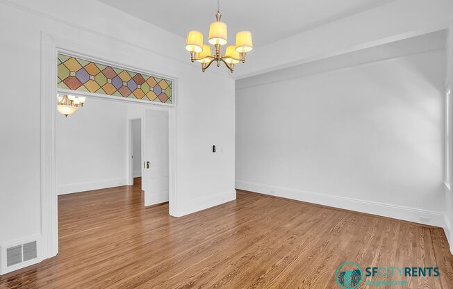 Mission: Bright Corner Condo with Garage Parking & W/D in-unit