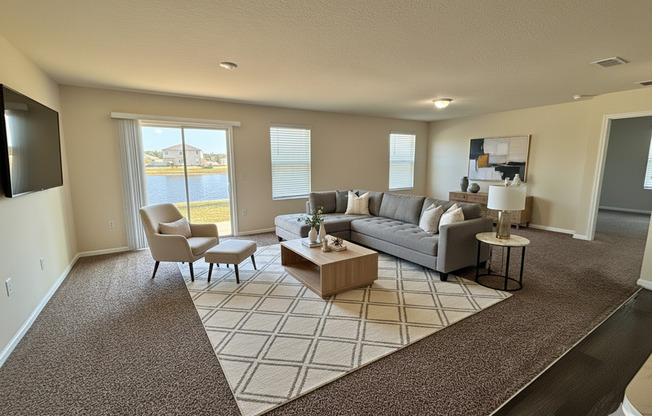 Beautiful 4 Bed 3 Bath Home. Move-In Ready with Amenities. Double Garage. Peaceful Water View! Washer Dryer Included!