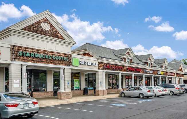 A Starbucks Coffee sign is on a building.