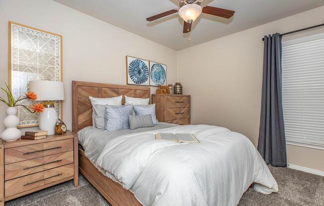 a bedroom with a bed in a room
