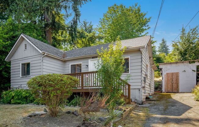 Charming 1 BD 1 BA cottage nestled on a beautifully landscaped lot