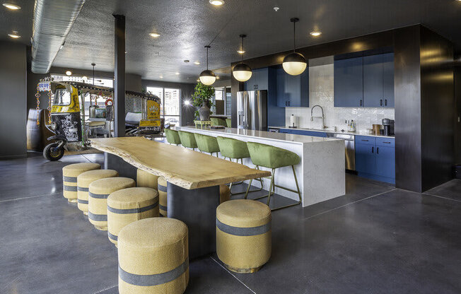 a table with stools at Lotus Republic Apartments for rent in Downtown Salt Lake City, Utah