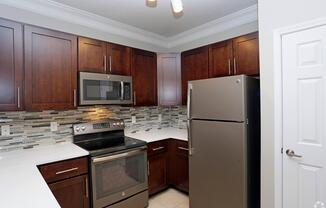Kitchen at Emerson at Cherry Lane Apartments in Laurel, MD