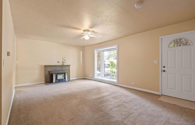 Charming, retro 2-bdrm/2-bath ranch w/ large family room in tranquil setting