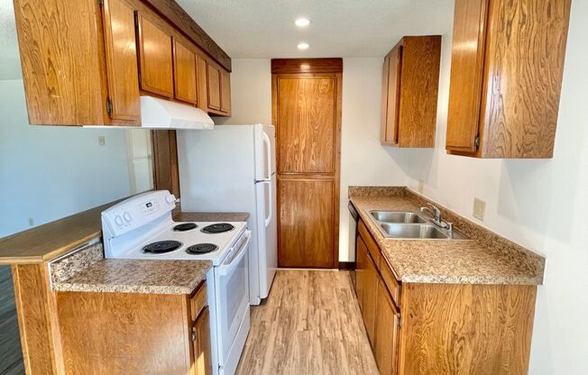 Sunny Top-Floor 2BR/2BA Home with Garage & A/C