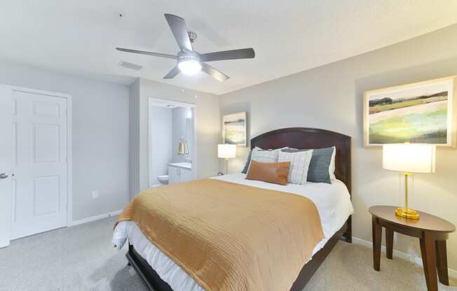 a bedroom with a large bed and a ceiling fan at Twenty35 at Timothy Woods, Athens, 30606