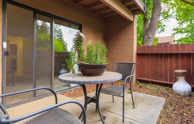 a chair sitting in front of a house