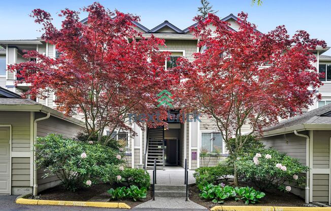 Rare Ground-Floor, End Unit with massive bonus office and Private 2-Car Garage!