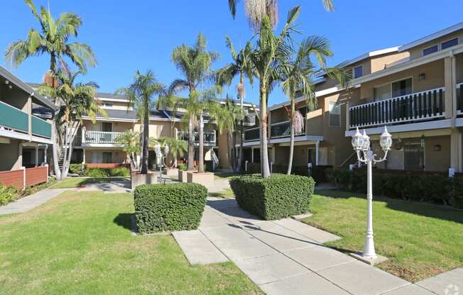 Full courtyard view with landscape and enclosing buildings