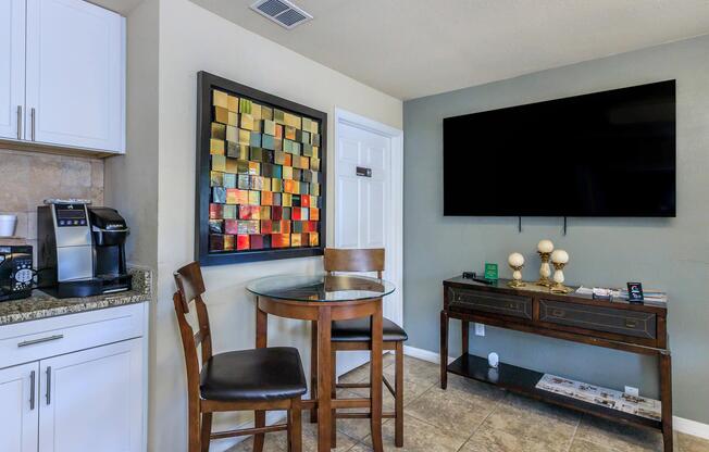 a kitchen with a table in a living room