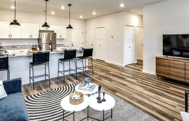 Studio, one and two bedroom apartment homes featuring stainless steel appliances, luxury vinyl floor, granite countertops, large closets and full-size washer and dryer at The Parker in Papillion, NE